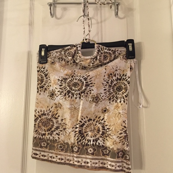 Tight fitting halter top- shows midriff