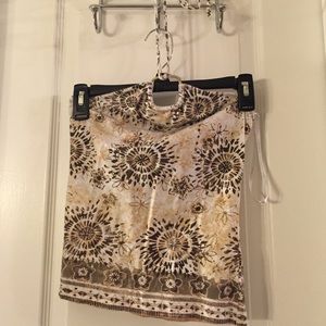 Tight fitting halter top- shows midriff