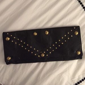 Black studded clutch