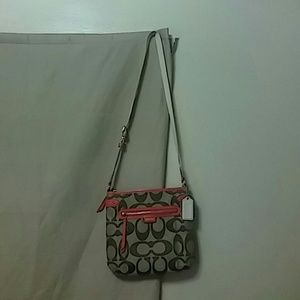 Over the shoulder Coach purse