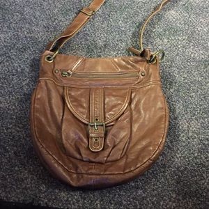 Brown sling purse