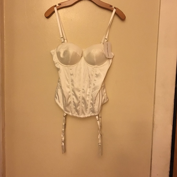 White bustier, size 38B, with garters.