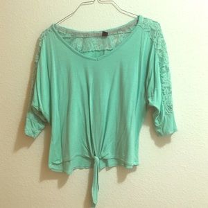 A turquoise quarter sleeve top