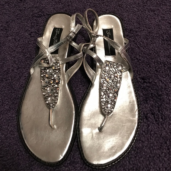 Silver and gem sandals.