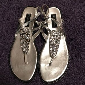 Silver and gem sandals.