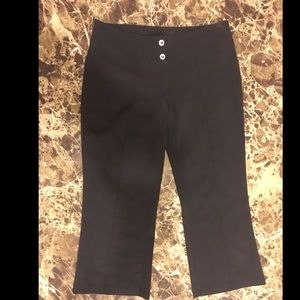 Woman's black capris, says size 9 fits like 6 or 7