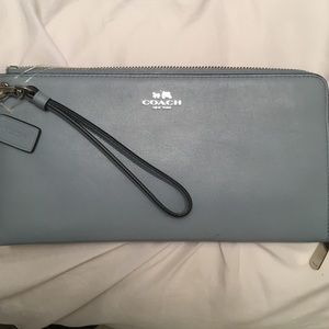 Blue coach wallet/wristlet. 10inx5in