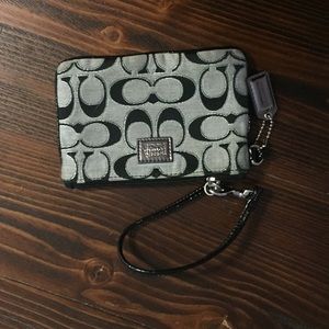 Small black and grey signature print wristlet