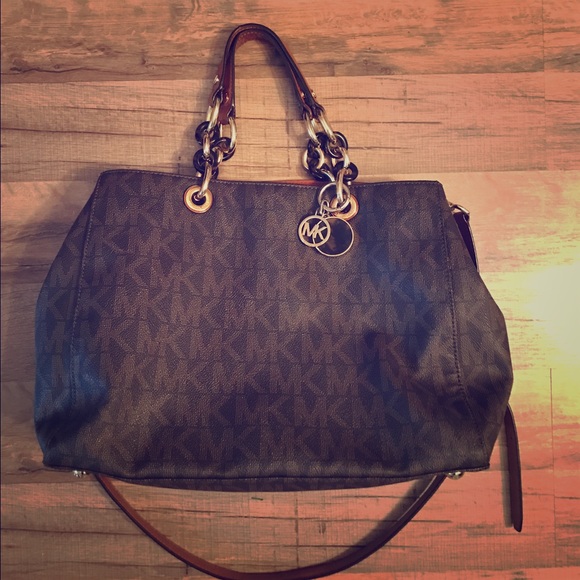 Brown MK multi-way bag