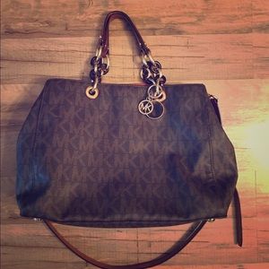 Brown MK multi-way bag