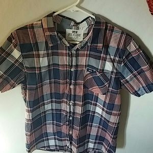Short sleeve plaid button up shirt.