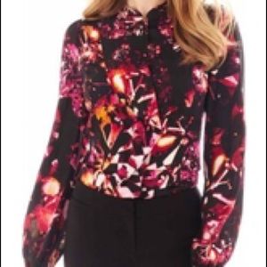 Long sleeved ruffle front blouse