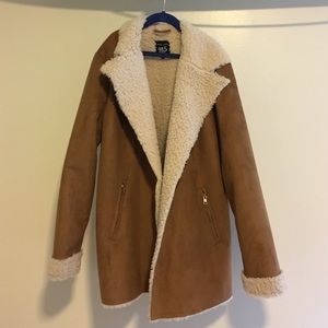 A long brown fur coat