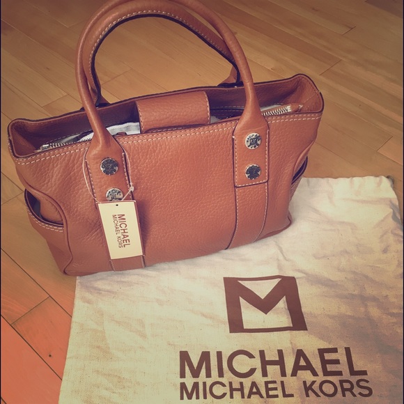 Michael Kors
Greenwich Pebbled Leather Handbag