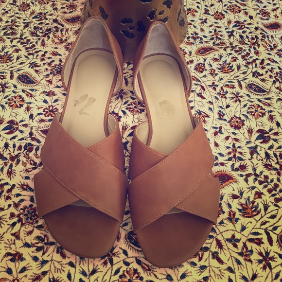 Cognac colored flats.