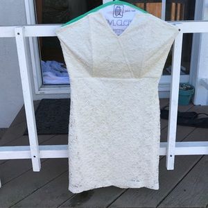 White lace dress by Nasty Gal