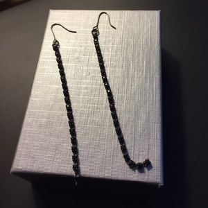 Long black faceted earrings
