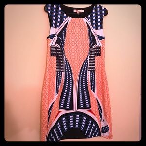 Geometric form fitting dress sized med
