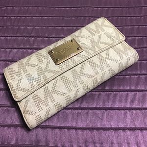 MK Jet set checkbook wallet