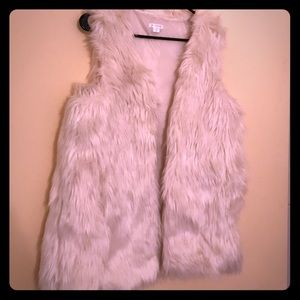 Faux fur vest with pockets.