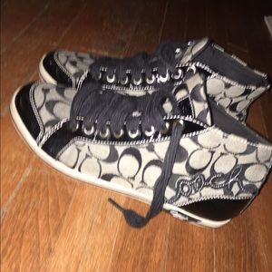 Black and gray Coach Hightop sneakers