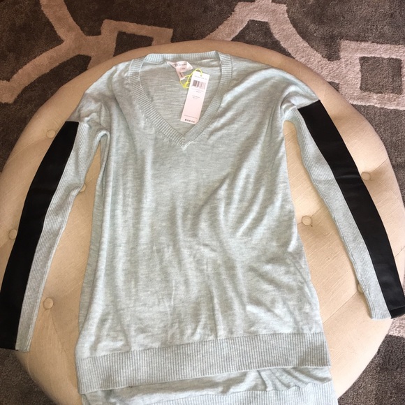 BCBG blue sweater with black leather sleeves!