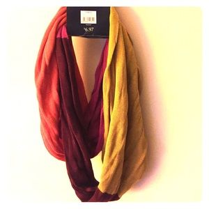 Multi color infinity scarf. Never worn.