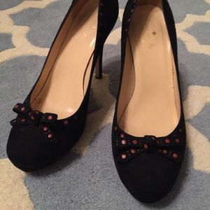 Darling black suede pumps.