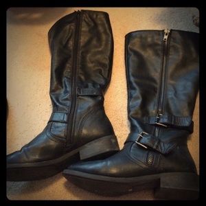 Tall black riding boots