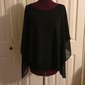 Long sleeve shirt with sheer fabric poncho overlay