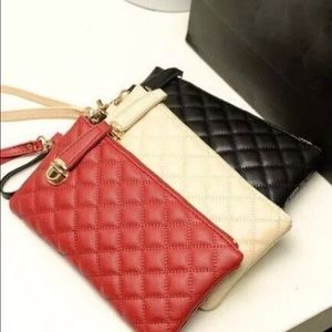 New woman's leather clutch handbag wallet
