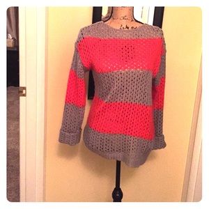 Coral and Grey knit sweater.