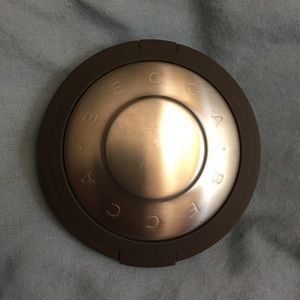 Becca x Jaclyn Hill highlight in Champagne Pop