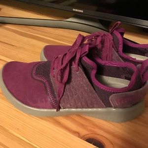 Purple Reebok tennis shoes.