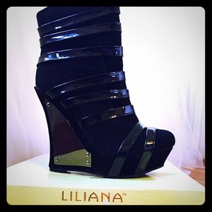 Black suede and patent strapped booties