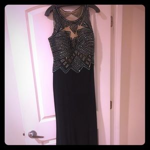 Fitted formal jersey dress with Aztec beading