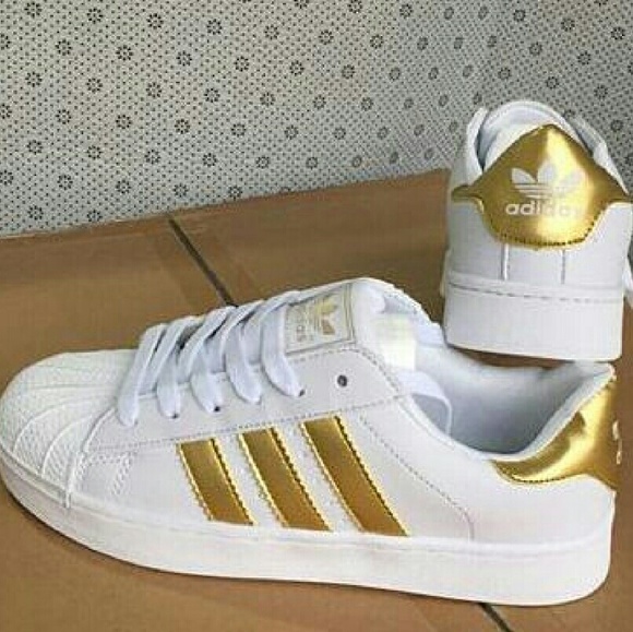 adidas superstar gold stripe