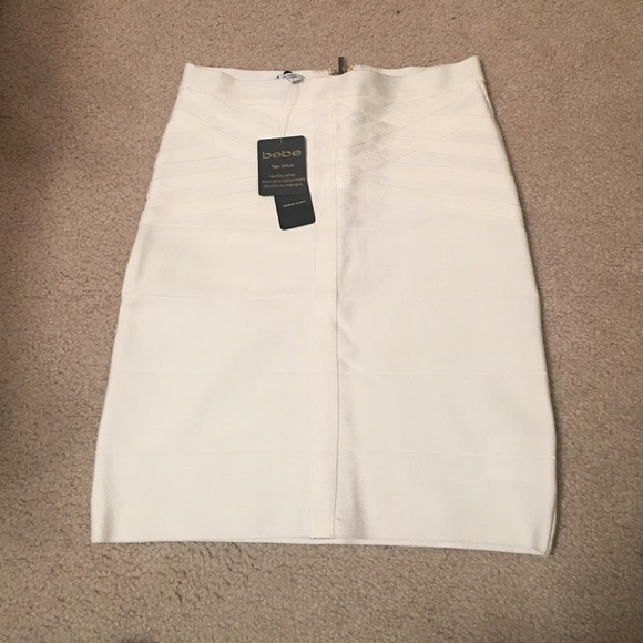 BRAND NEW bebe white bandage skirt