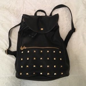 NWOT gold-stud faux leather backpack