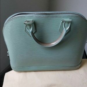 Louis Vuitton Elma Elpi leather bag.