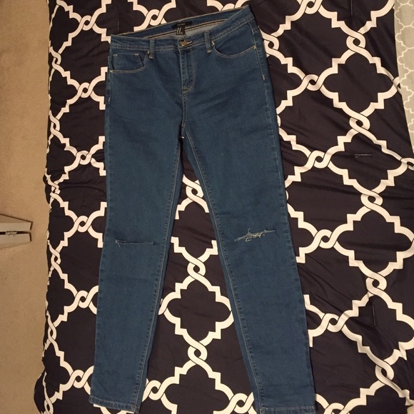 Forever 21 blue jeans with slit at knee size 30