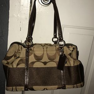 Tan and black Signature Coach bag