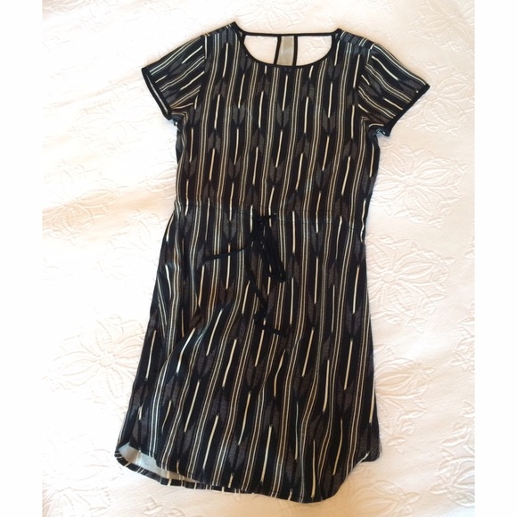 NWOT. Cotton dress with cut out back. Boutique.