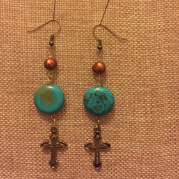Boho turquoise and gold cross dangle earrings.