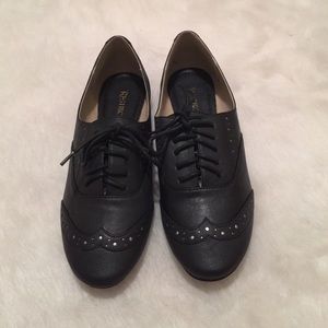 Black flats with silver design