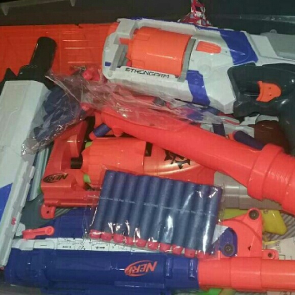 Bin full of Nurf guns different sizes