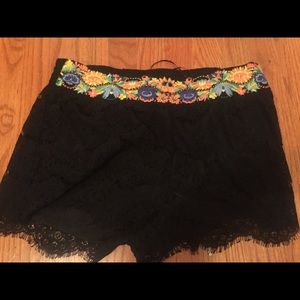 never worn black lace shorts with floral wasteband