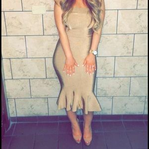 Strapless sexy body hugging dress in champagne.