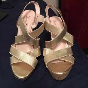 Lauren Lauraine hold wedges