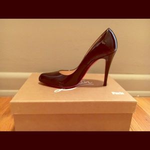 Christian Louboutin black pumps